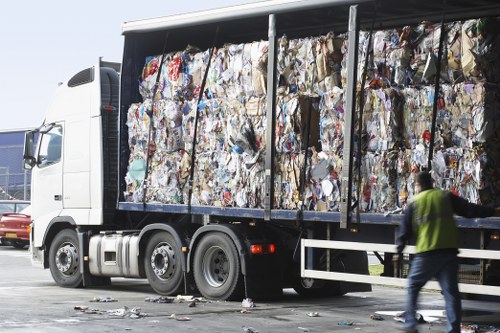 Waste vehicle being inspected and prepared for refuse collection duty